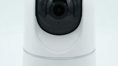 a white camera on a white surface