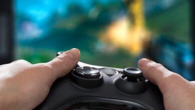Gaming controller playing a video game e1529637318582